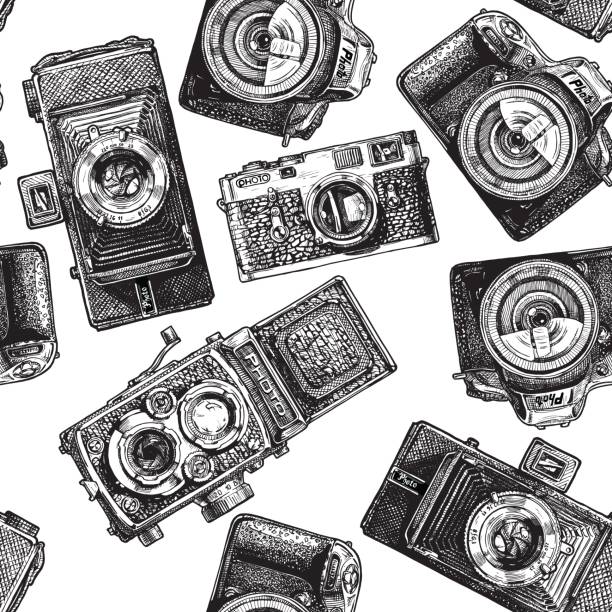 bezszwowy wzór z aparatami fotograficznymi - rangefinder camera stock illustrations