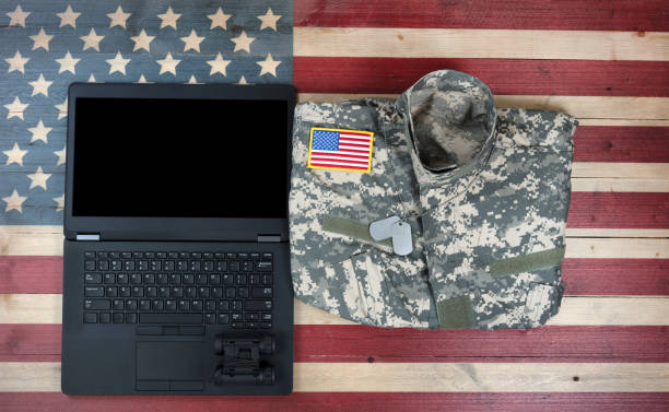 istock USA Military and Modern Technology on rustic wooden flag 697674360