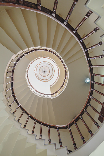 Spacious, clean and bright indoor spiral staircase