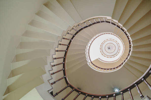 istock Curved stairway that view from below in Kolkata, India. 697675290