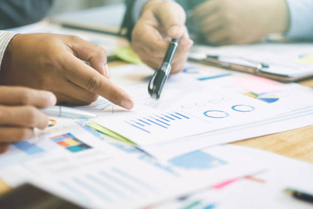 istock Business teamwork people meeting design Ideas and analyzing income charts and graphs. concept business planning. close up business workplace strategy Concept 697686070