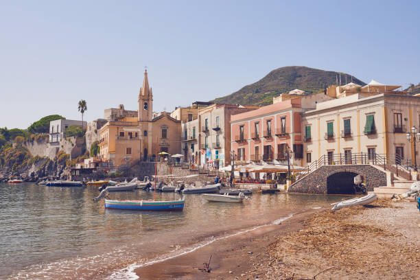 Aeolian Islands - Lipari - Sicily - Harbor, church in the background Aeolian Islands - Lipari - Sicily - Harbor, church in the background salina sicily stock pictures, royalty-free photos & images