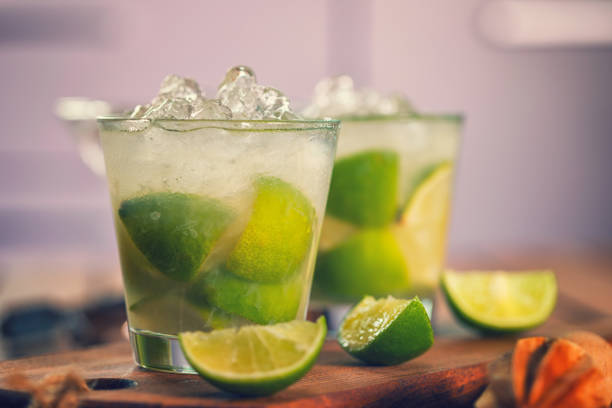 Sweet and refreshing Caipirinha national cocktail from Brazil made with lime,ice, sugar, and a sugarcane liquor