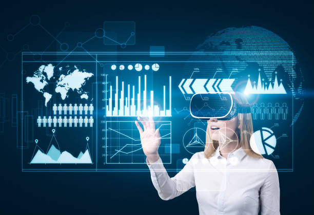 istock Businesswoman in vr glasses and graphs 697712110