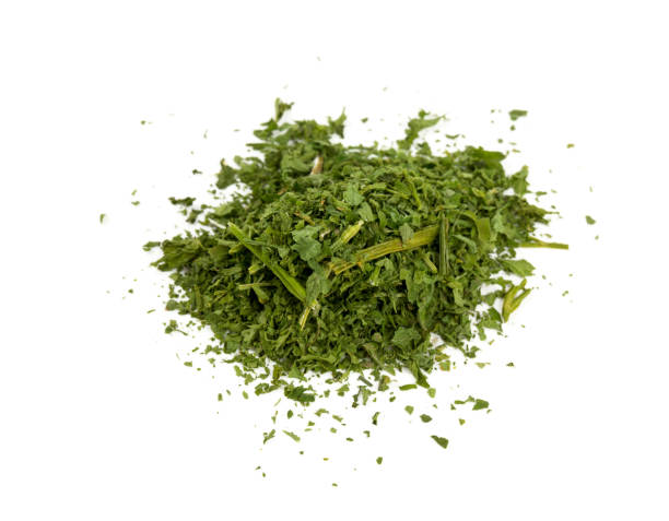 istock dried parsley isolated on white 697712602