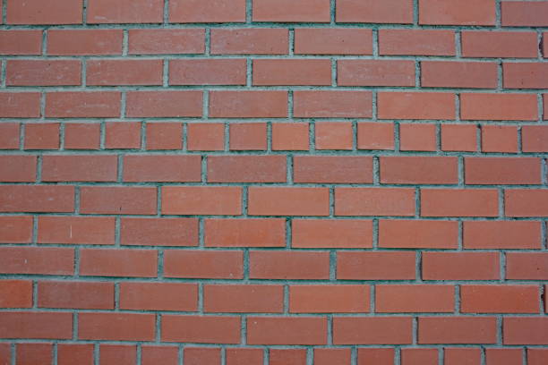 istock Texture of a wall from a red brick 697716056