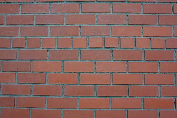 istock Texture of a wall from a red brick 697716060