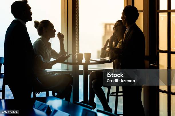Office Employees Having Coffee Break And Talking Stock Photo - Download Image Now - India, Employee, Teamwork