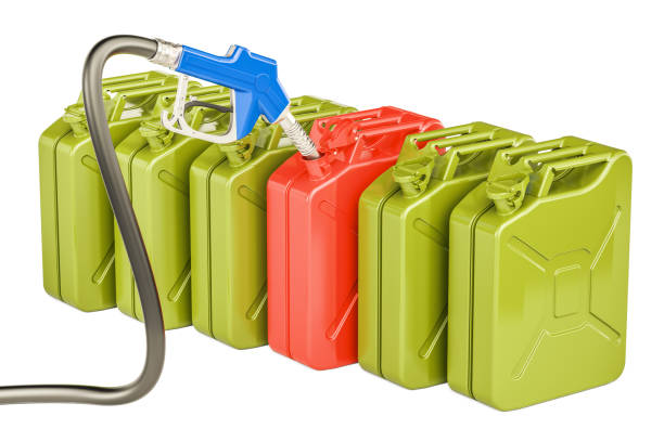 istock Gas pump nozzle and jerrycans, 3D rendering isolated on white background 697722760