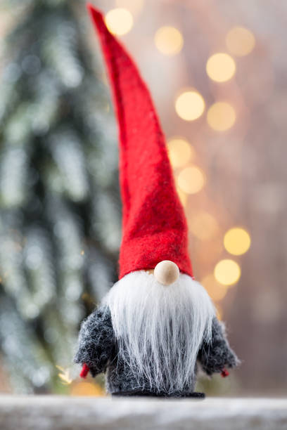 istock Christmas greeting card. Gnome festive background. New year symbol. 697723244