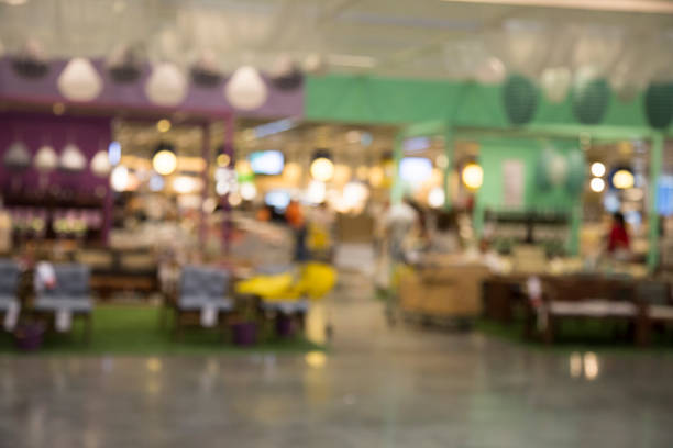 istock Abstract blur beautiful luxury shopping mall and retails store interior for background 697723400