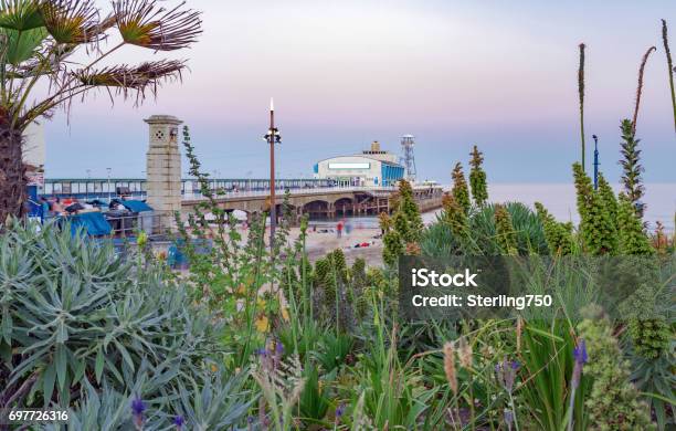 Bournemouth Pier And Seascape At Early Nightfall Stock Photo - Download Image Now - Bournemouth - England, Pier, Awe