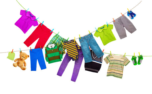 istock Laundry lines with colorful clothes, isolated on white background 697735718
