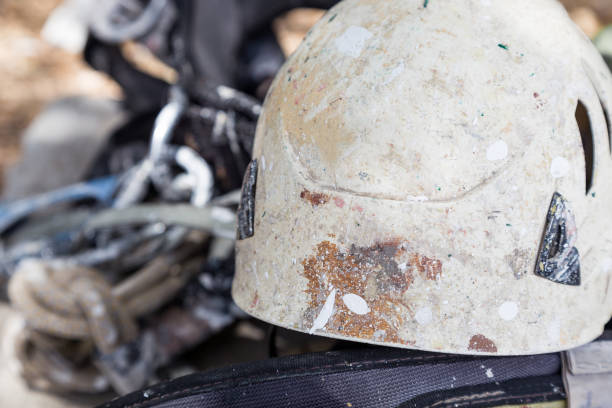 istock helmet with rope and tools for industry alpinism job 697738648