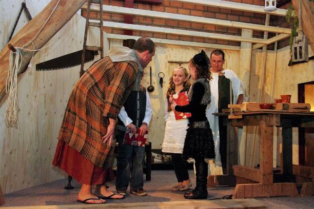 Christmas Representaion Schinnen, the Netherlands, - December 25, 2012.  Representation of a Bible story with actors and children in a Carpenter workshop at Christmas. song title stock pictures, royalty-free photos & images