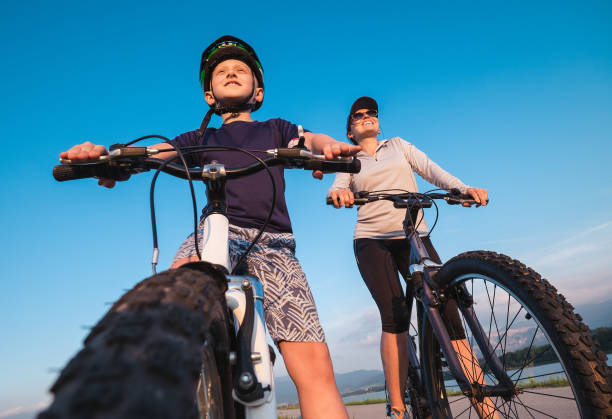 istock Mother with son ready for bicycle ride 697749666