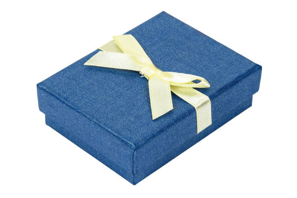 istock Blue decorative present box with yellow ribbon 697753112