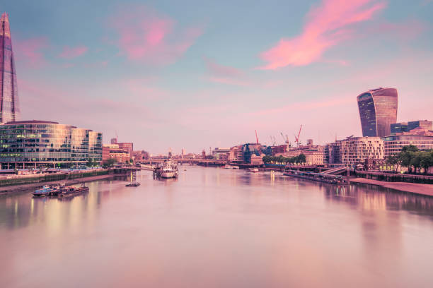 istock London skyscrapers reflect in Thames river 697759162