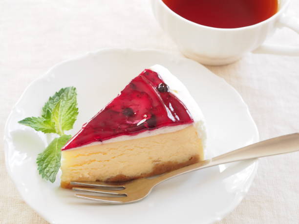 istock Cheesecake with Berries Sauce and Green Mint 697760162