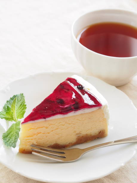 istock Cheesecake with Berries Sauce and Green Mint 697760208