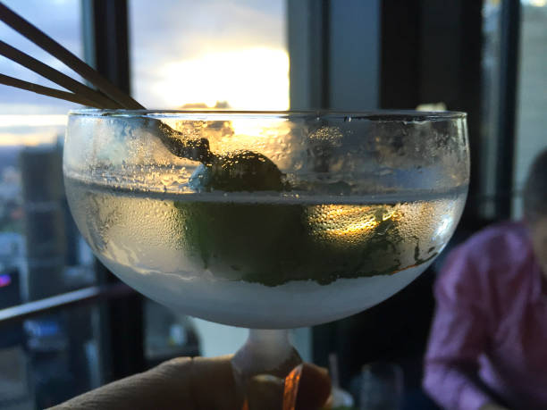 Cocktails in a high rise building. Could be a restaurant or and apartment.