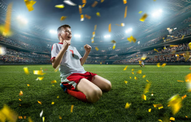 istock Soccer kids player rejoice at victory 697770466