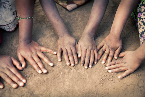 istock African Kids hands , Rwanda 697781142