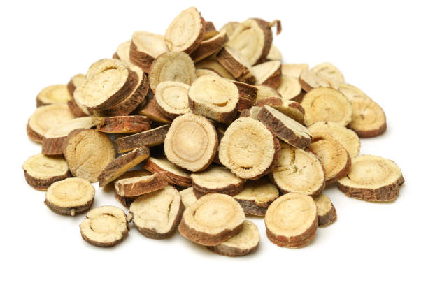 istock Liquorice or Licorice  roots on white background 697787488