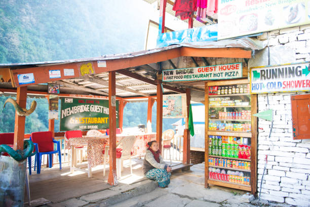 Kathmandu, Nepal - December 9, 2018: A man selling snacks at the side street of Kathmandu.
