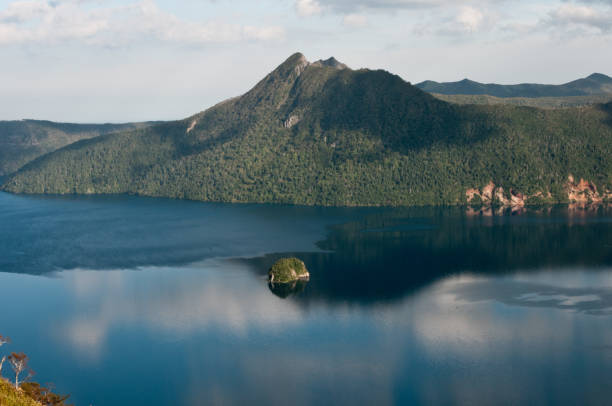 istock Quiet lake showing the mountains 697791498