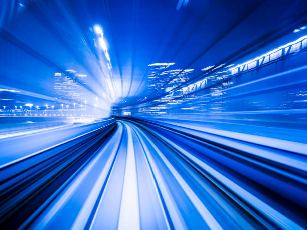 istock Motion blur train moving in city rail tunnel. 697797520