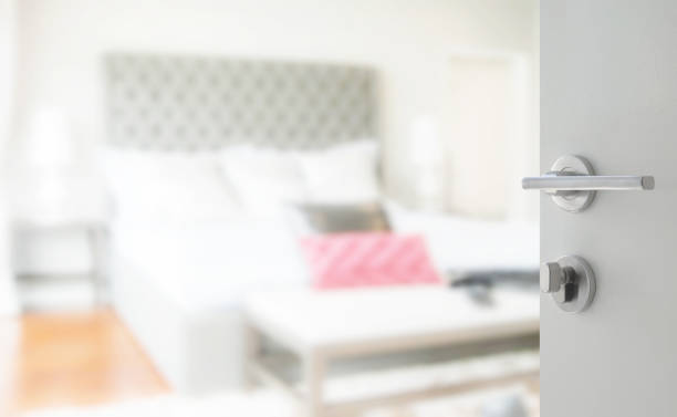 istock opened white door to bedroom in classic style interior 697797760