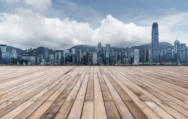 istock empty wooden platform with Shanghai skyline in background 697798130