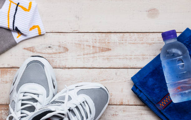 istock Sport shoes,sock , towel and water 697798190