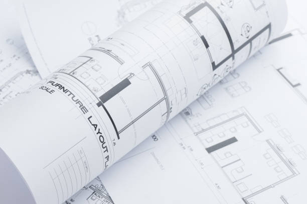 istock architectural drawing paper rolls of a dwelling for construction 697800416