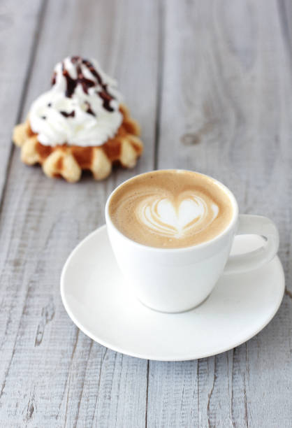 Hot coffee cafe latte with waffle