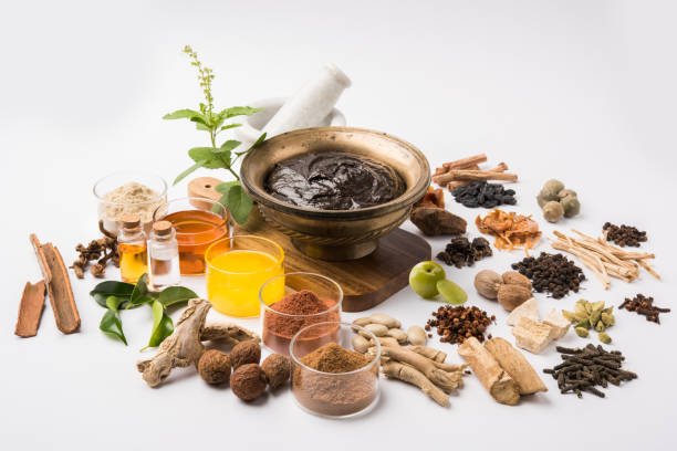 istock Indian Ayurvedic dietary supplement called Chyawanprash / chyavanaprasha  is a cooked mixture of sugar, honey, ghee, Indian Gooseberry (amla), jam, sesame oil, berries, herbs and various spices 697801478