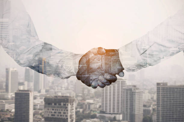 istock Handshake of businessmen. 697802024
