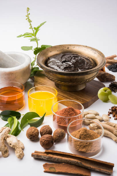 istock Indian Ayurvedic dietary supplement called Chyawanprash / chyavanaprasha  is a cooked mixture of sugar, honey, ghee, Indian Gooseberry (amla), jam, sesame oil, berries, herbs and various spices 697804380
