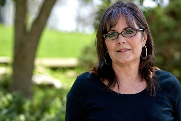 istock Mature Woman wearing Glasses 697804928
