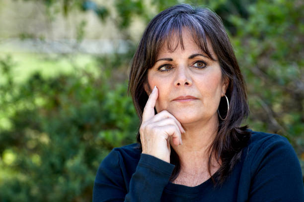 istock Middle Aged Woman Contemplating 697805076