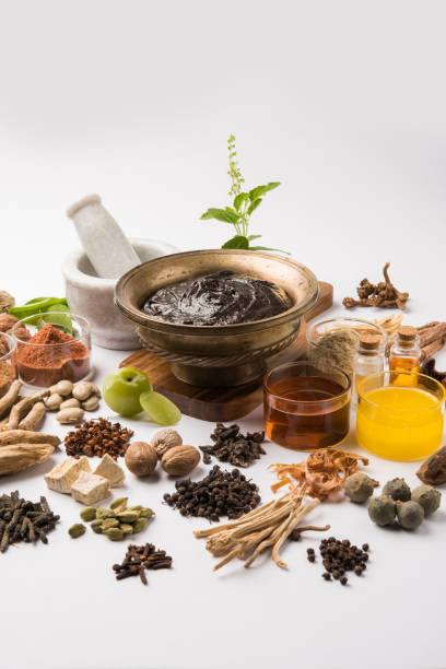 istock Indian Ayurvedic dietary supplement called Chyawanprash / chyavanaprasha  is a cooked mixture of sugar, honey, ghee, Indian Gooseberry (amla), jam, sesame oil, berries, herbs and various spices 697805146