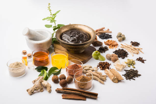 Indian Ayurvedic dietary supplement called Chyawanprash / chyavanaprasha  is a cooked mixture of sugar, honey, ghee, Indian Gooseberry (amla), jam, sesame oil, berries, herbs and various spices stock photo