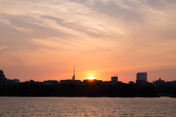 istock Beautiful, urban sunset and cloudscape over skyscraper 697805744