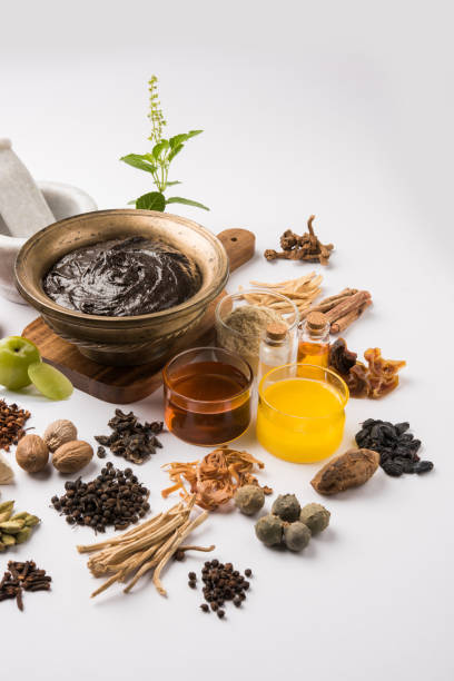 istock Indian Ayurvedic dietary supplement called Chyawanprash / chyavanaprasha  is a cooked mixture of sugar, honey, ghee, Indian Gooseberry (amla), jam, sesame oil, berries, herbs and various spices 697806084