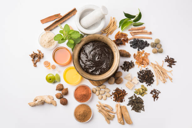 istock Indian Ayurvedic dietary supplement called Chyawanprash / chyavanaprasha  is a cooked mixture of sugar, honey, ghee, Indian Gooseberry (amla), jam, sesame oil, berries, herbs and various spices 697808388