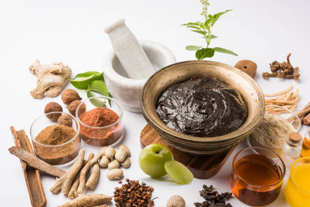 istock Indian Ayurvedic dietary supplement called Chyawanprash / chyavanaprasha  is a cooked mixture of sugar, honey, ghee, Indian Gooseberry (amla), jam, sesame oil, berries, herbs and various spices 697809164