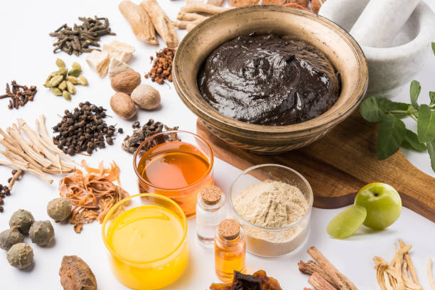 istock Indian Ayurvedic dietary supplement called Chyawanprash / chyavanaprasha  is a cooked mixture of sugar, honey, ghee, Indian Gooseberry (amla), jam, sesame oil, berries, herbs and various spices 697812094