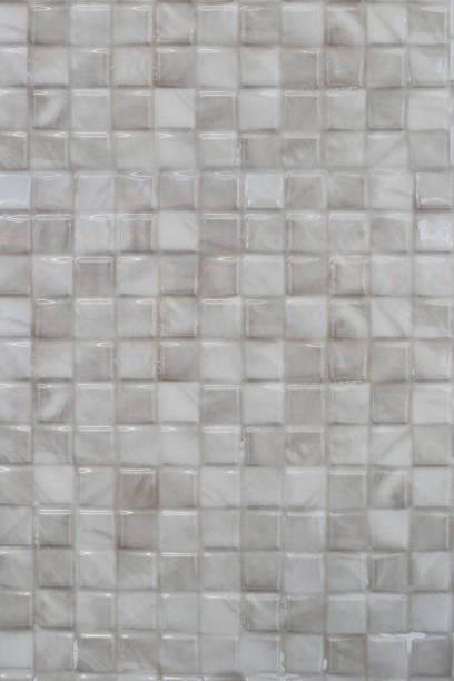 istock Tile stone wall Texture in weathered and have natural surfaces for design background. 697812442