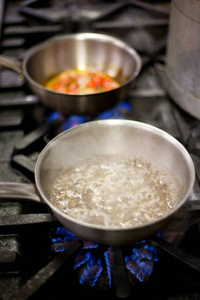 istock Food cooking on a stove 697819162